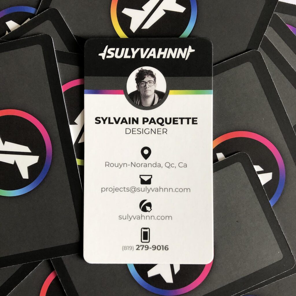 A Sulyvahnn business card face up on a background of face down cards